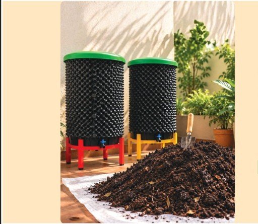Orbin composting bins with nutrient-rich compost ready for the soil