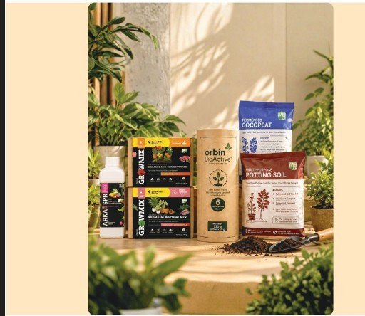 Orbin composting and gardening products arranged on a wooden table